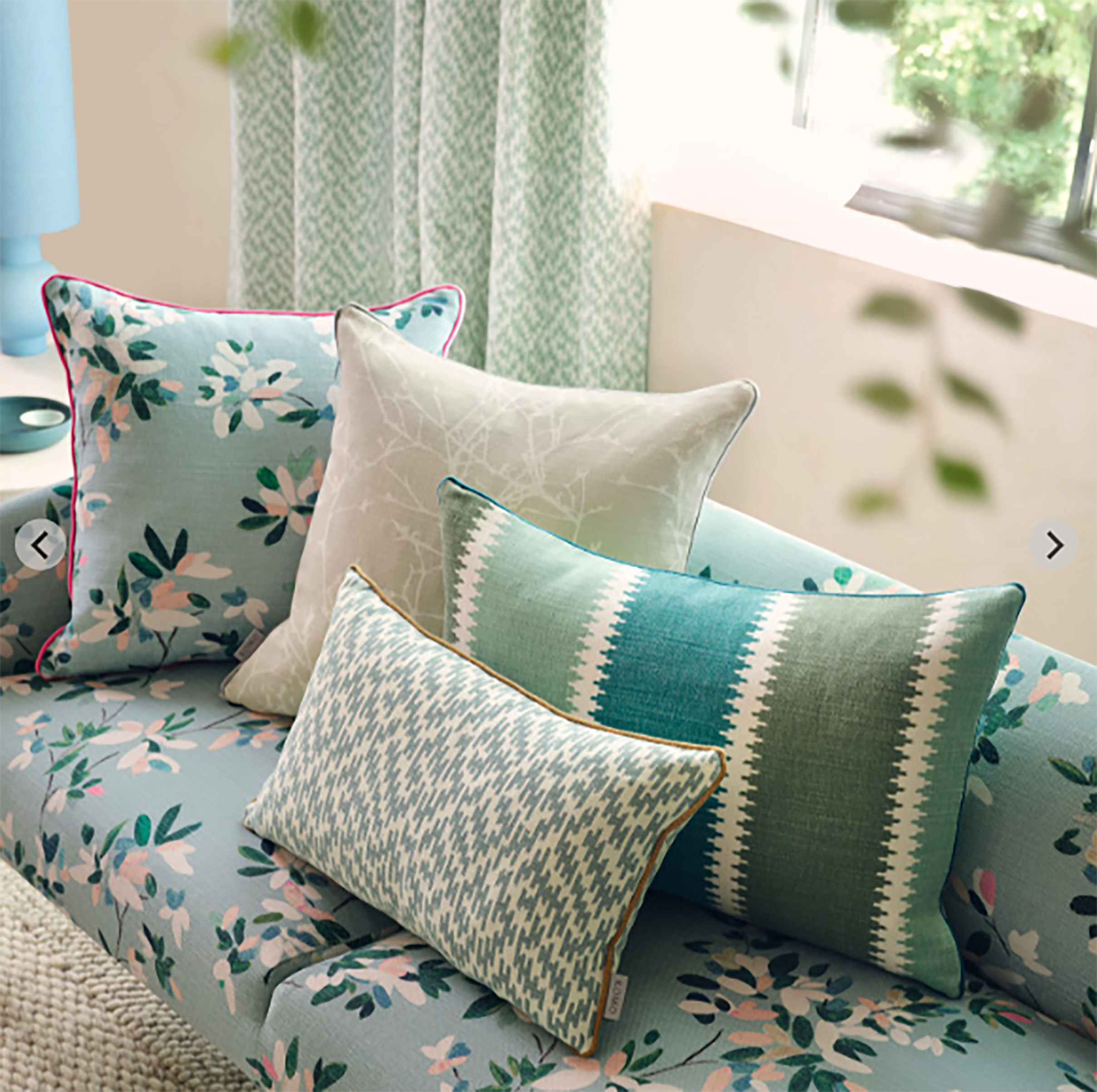Springing into Style Daybed nook with Spring Green Floral and Stripe Fabrics