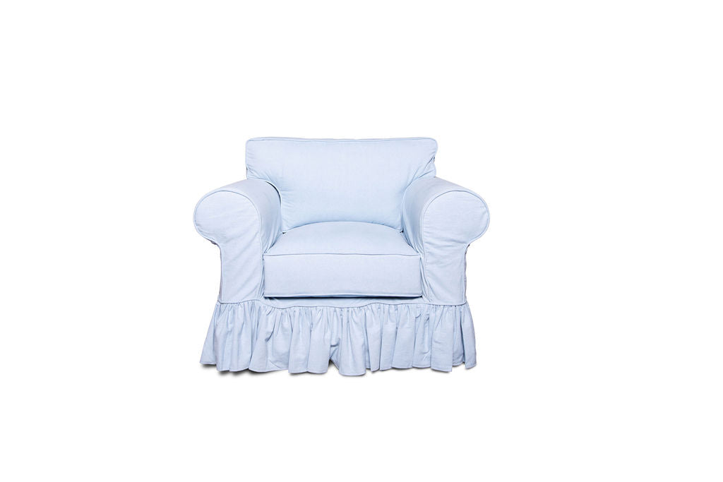 Front view of Slipcovered version in baby blue with ruffles. Crafted with timeless design and comfort in mind, the Khaki Rue Chair by Rue and Williams Home features a soft, pleated slipcover, and rounded arms with a square back.