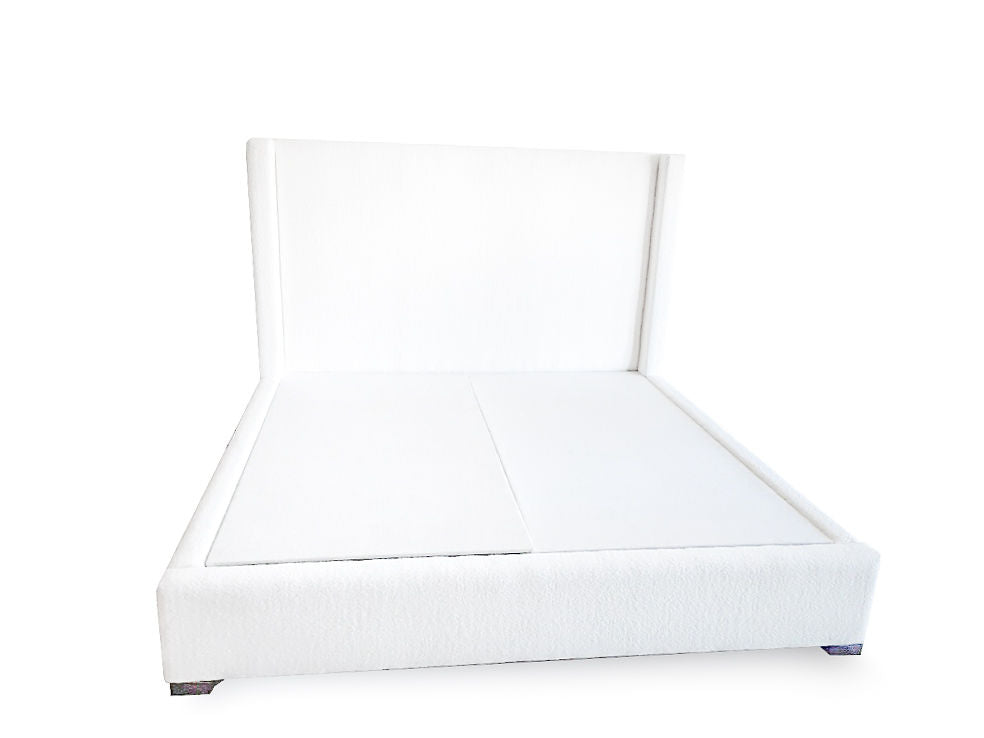 White custom fabric covered bed by Rue and Williams