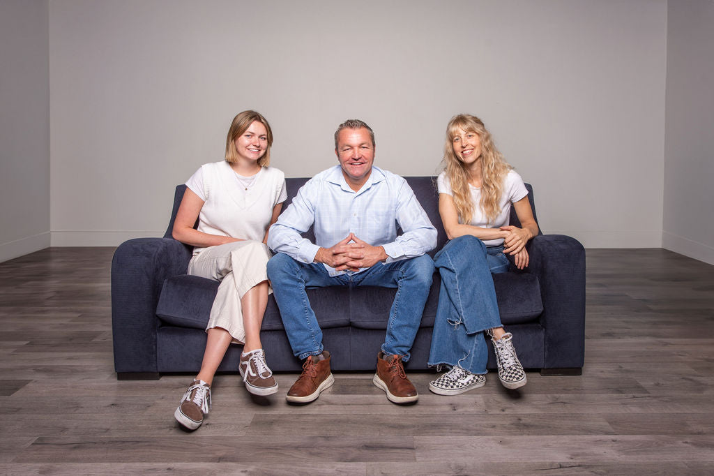Three Cofounders of Rue and Williams sitting on a sofa, two women and one man